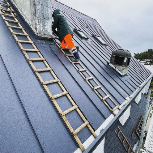 Réfection d'une toiture en ardoises naturelles et bardage en aluminium